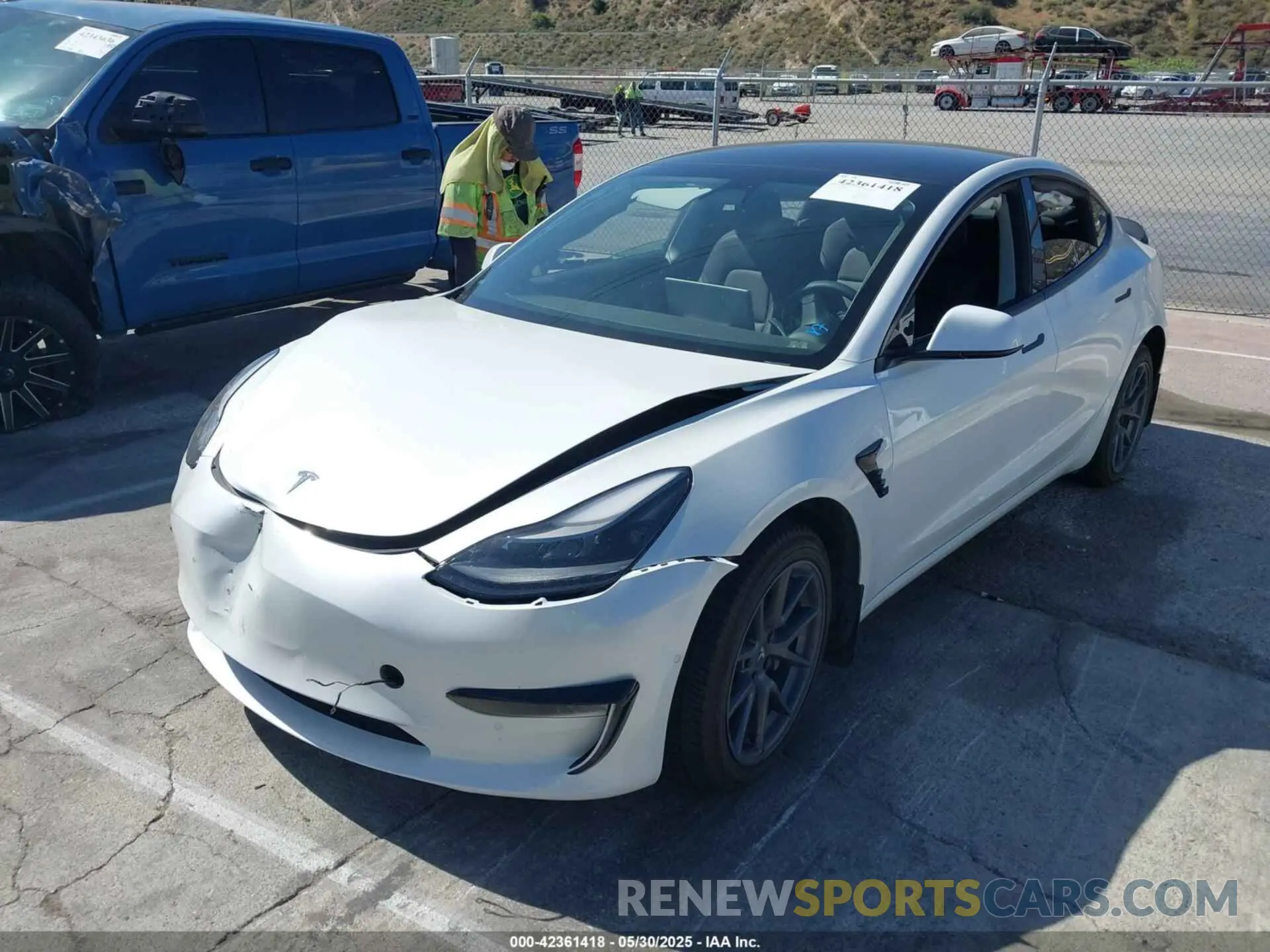 2 fotografías del automóvil dañado 5YJ3E1EB1NF106433 TESLA MODEL 3 2022