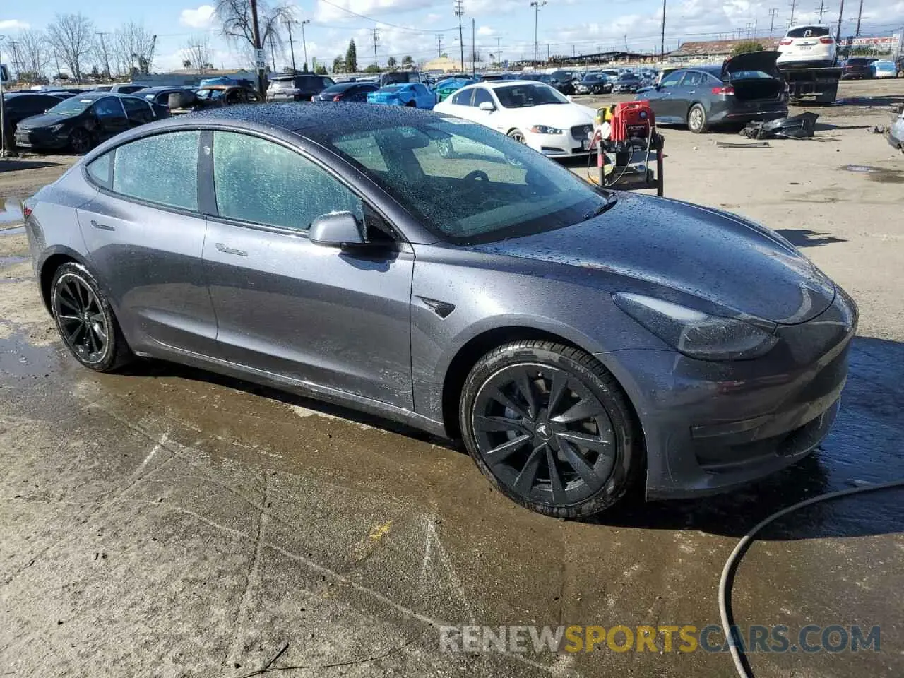 4 fotografías del automóvil dañado 5YJ3E1EB1NF125192 TESLA MODEL 3 2022