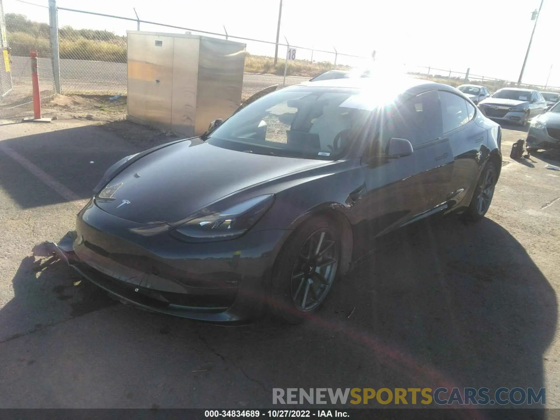 2 fotografías del automóvil dañado 5YJ3E1EB1NF125693 TESLA MODEL 3 2022