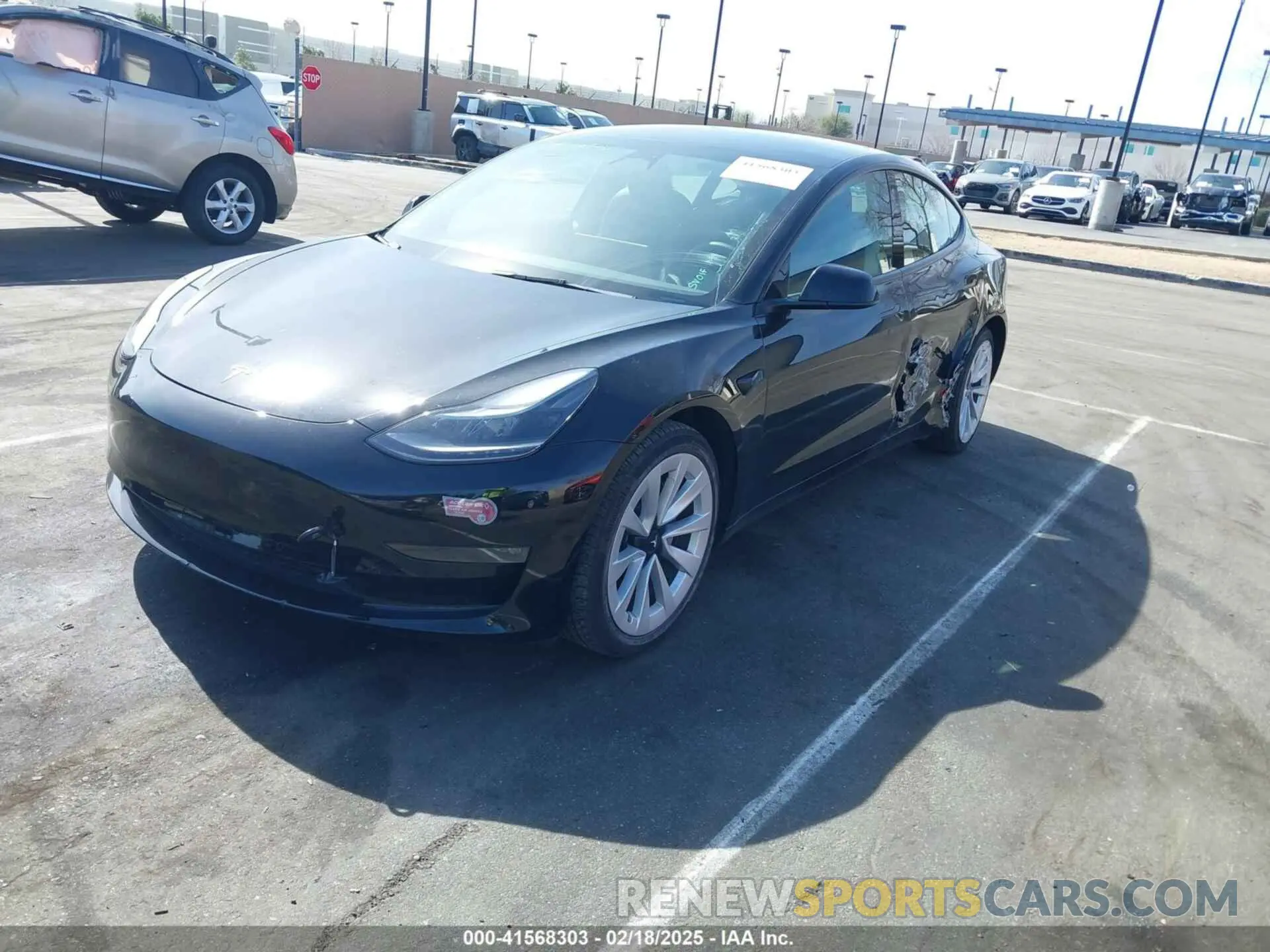 2 fotografías del automóvil dañado 5YJ3E1EB1NF133356 TESLA MODEL 3 2022