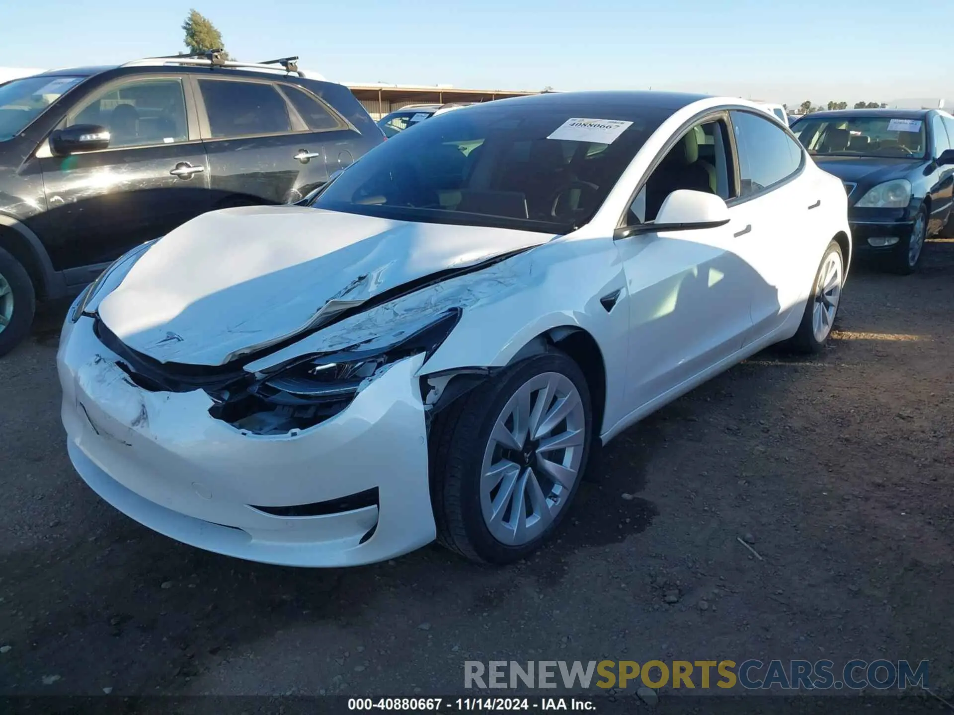 2 fotografías del automóvil dañado 5YJ3E1EB1NF137536 TESLA MODEL 3 2022