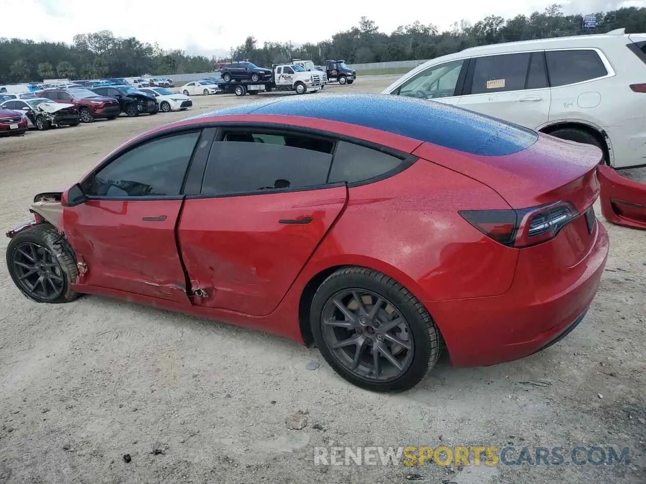 2 fotografías del automóvil dañado 5YJ3E1EB1NF185005 TESLA MODEL 3 2022
