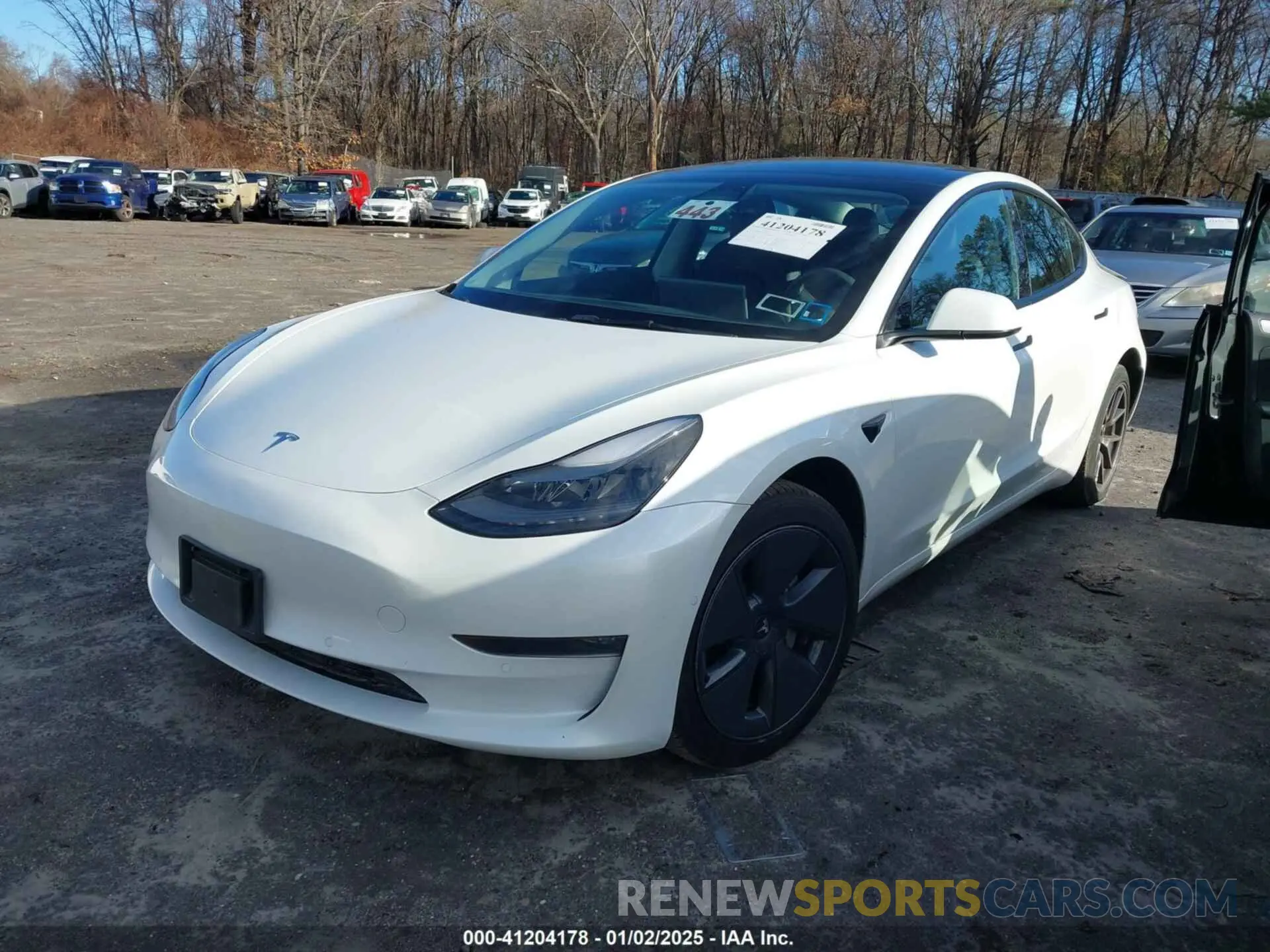 2 fotografías del automóvil dañado 5YJ3E1EB1NF237510 TESLA MODEL 3 2022