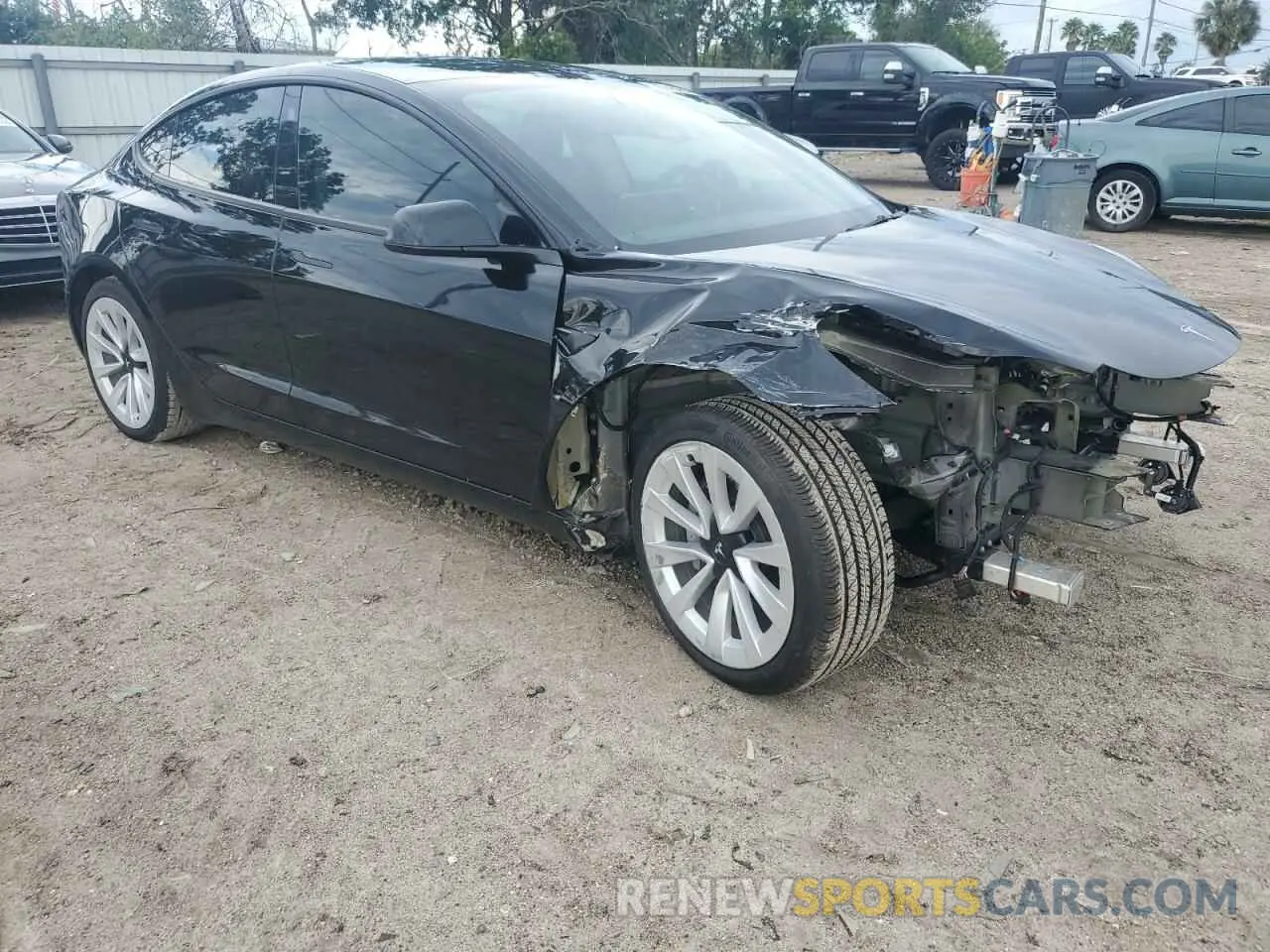 4 fotografías del automóvil dañado 5YJ3E1EB1NF243484 TESLA MODEL 3 2022