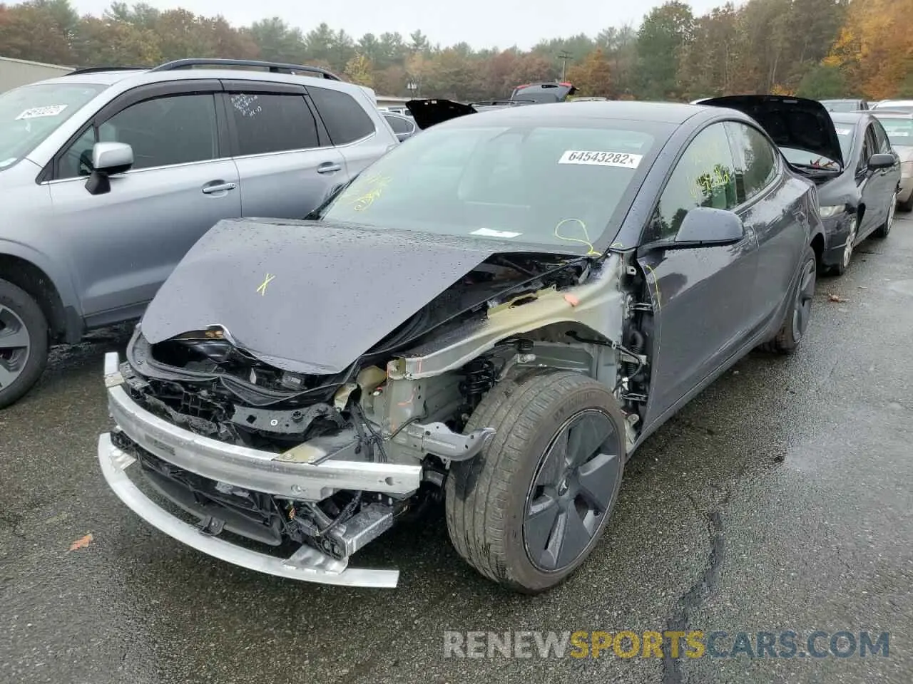 2 fotografías del automóvil dañado 5YJ3E1EB1NF278316 TESLA MODEL 3 2022