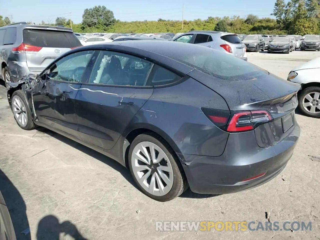 2 fotografías del automóvil dañado 5YJ3E1EB1NF288974 TESLA MODEL 3 2022
