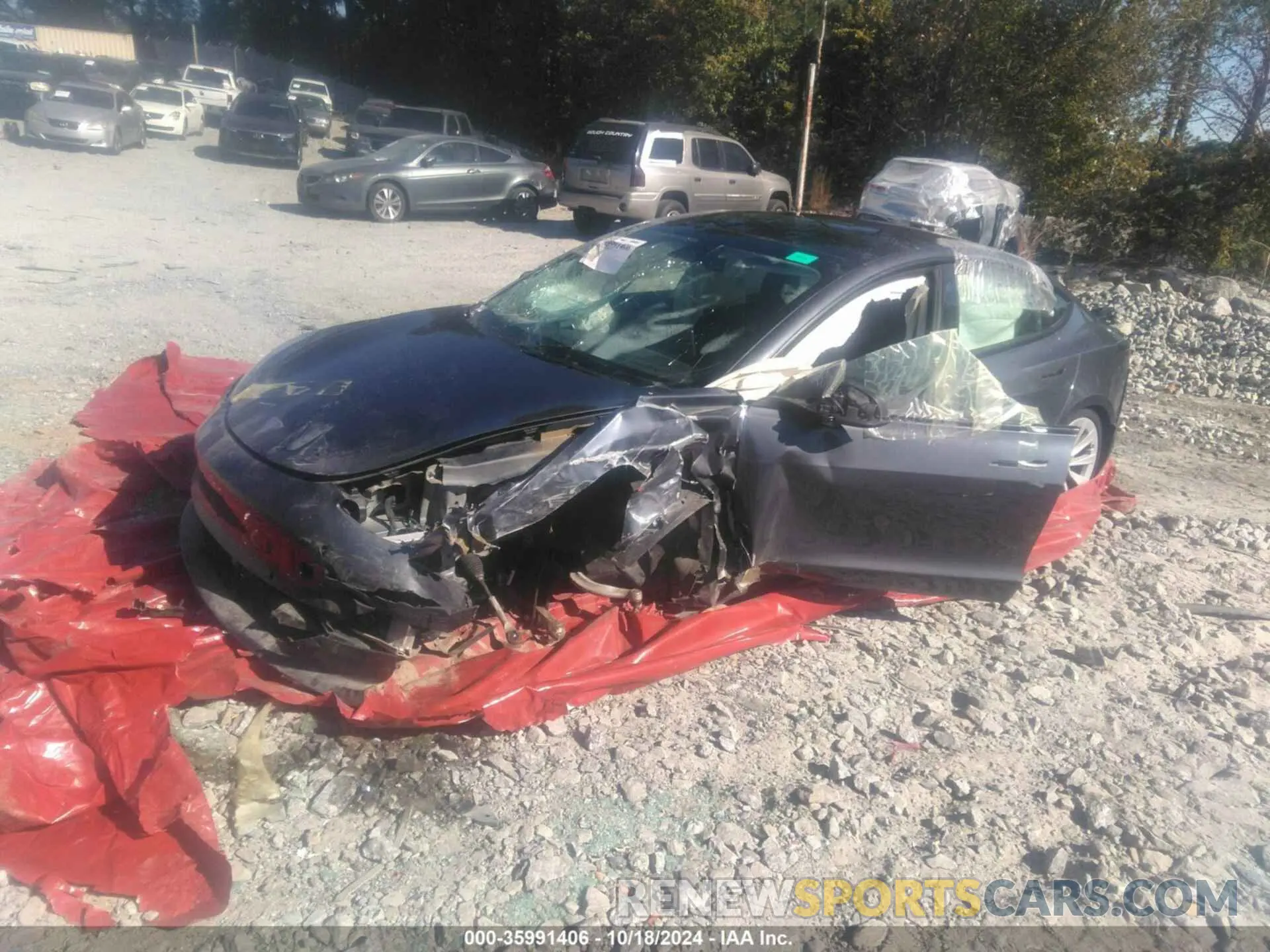 2 fotografías del automóvil dañado 5YJ3E1EB1NF304915 TESLA MODEL 3 2022