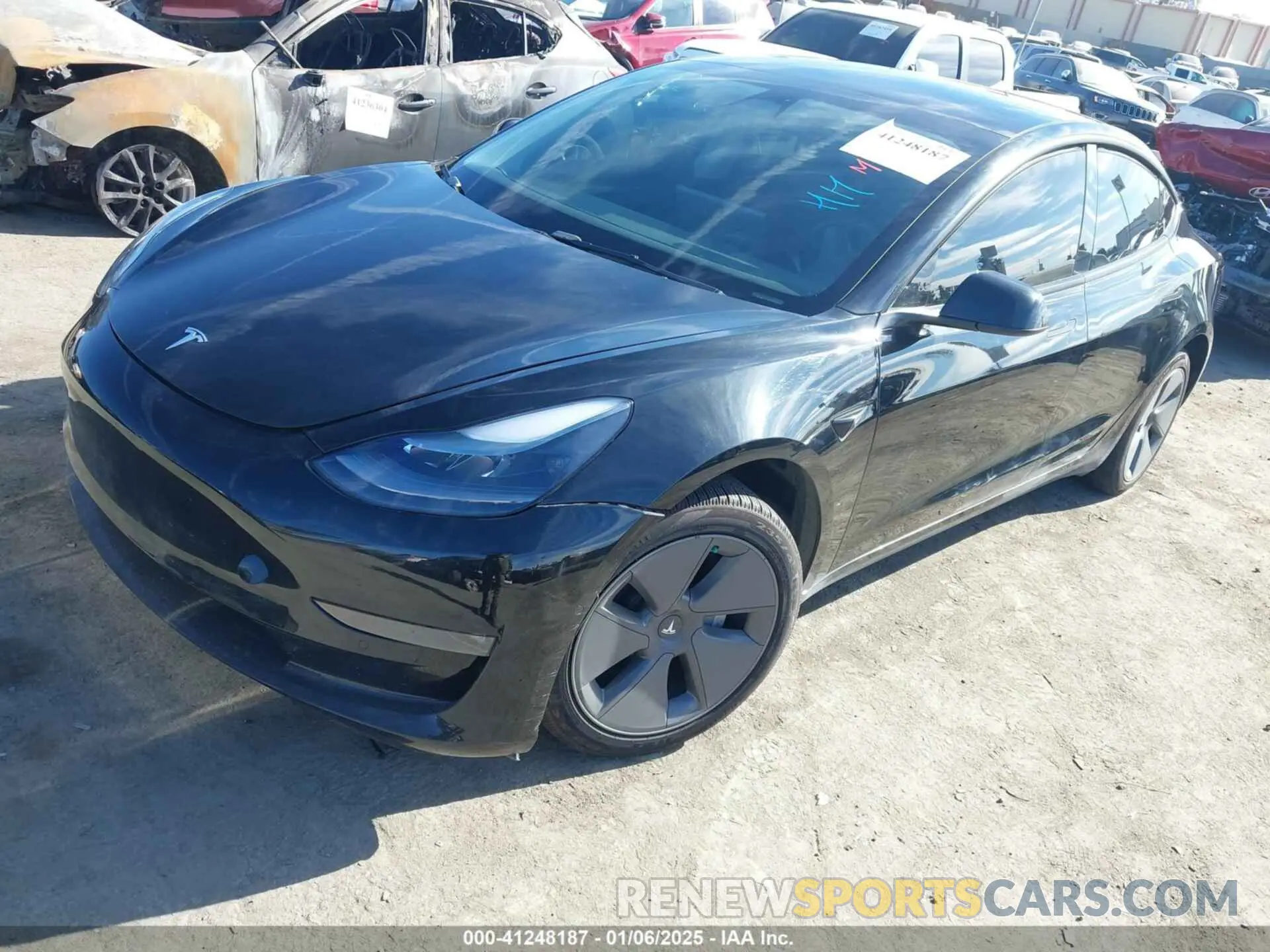 2 fotografías del automóvil dañado 5YJ3E1EB1NF313954 TESLA MODEL 3 2022