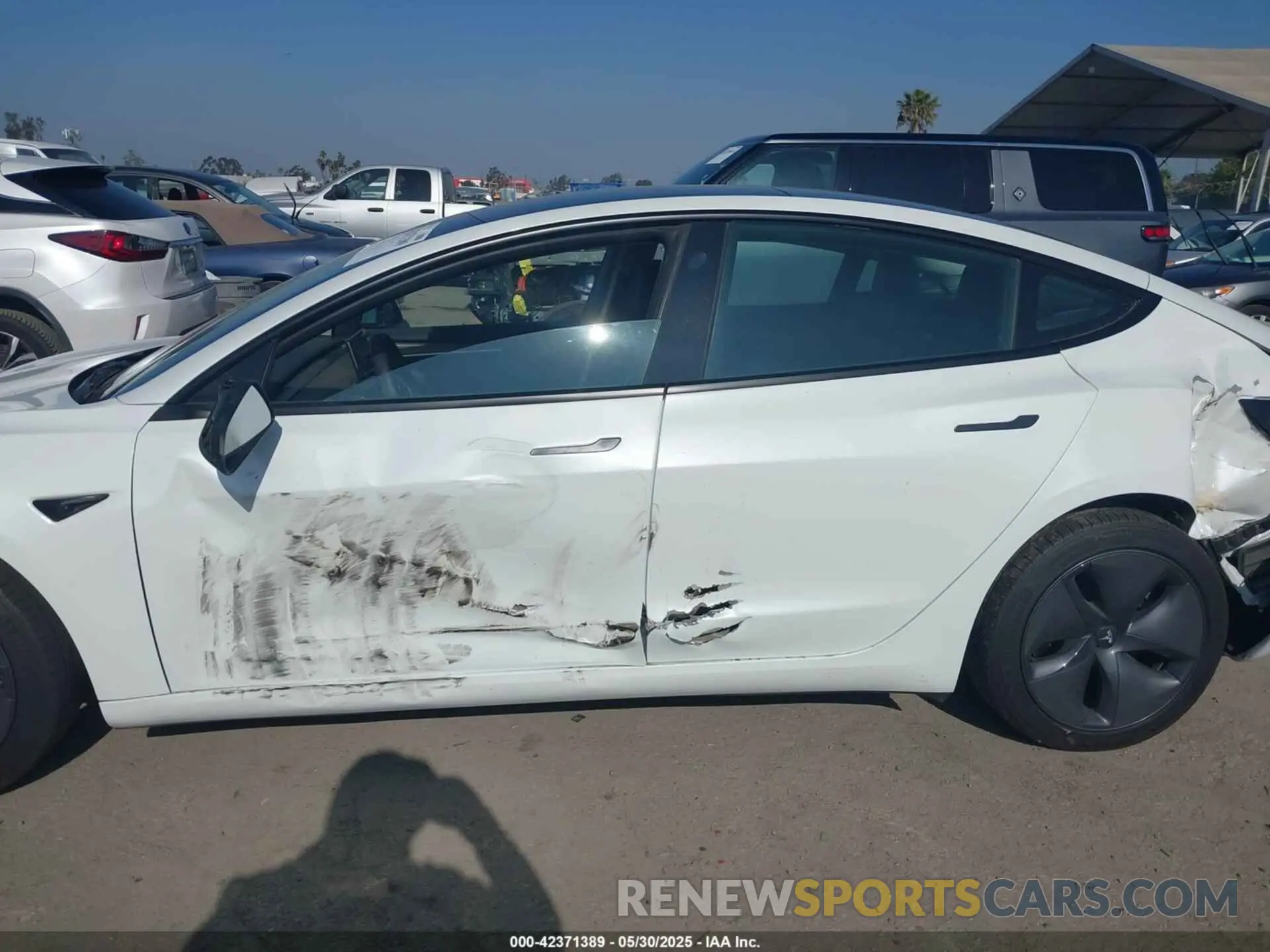 14 fotografías del automóvil dañado 5YJ3E1EB1NF332200 TESLA MODEL 3 2022