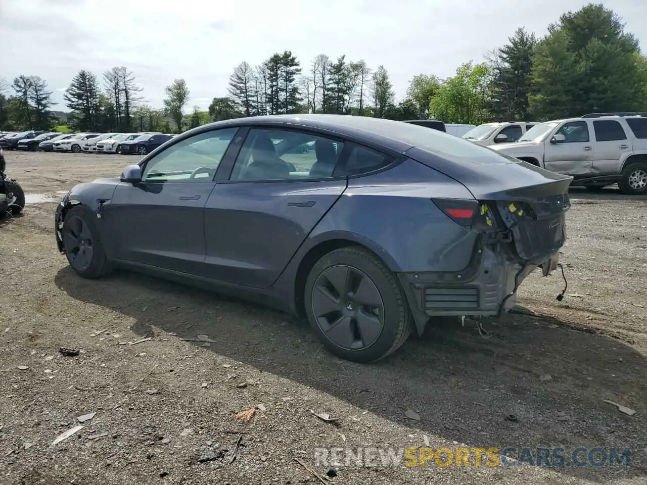 2 fotografías del automóvil dañado 5YJ3E1EB2NF111804 TESLA MODEL 3 2022