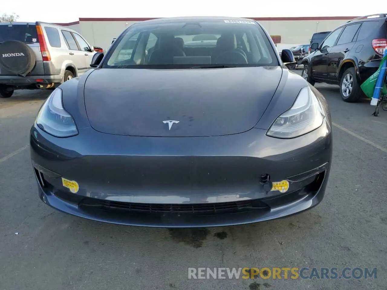 5 fotografías del automóvil dañado 5YJ3E1EB2NF121989 TESLA MODEL 3 2022