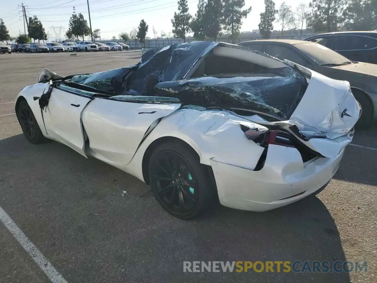 2 fotografías del automóvil dañado 5YJ3E1EB2NF145385 TESLA MODEL 3 2022