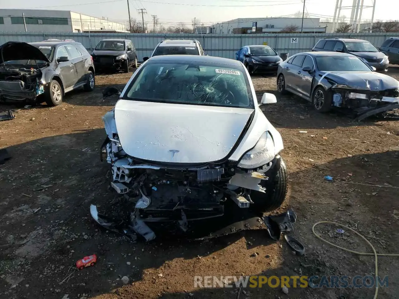 5 fotografías del automóvil dañado 5YJ3E1EB2NF179651 TESLA MODEL 3 2022