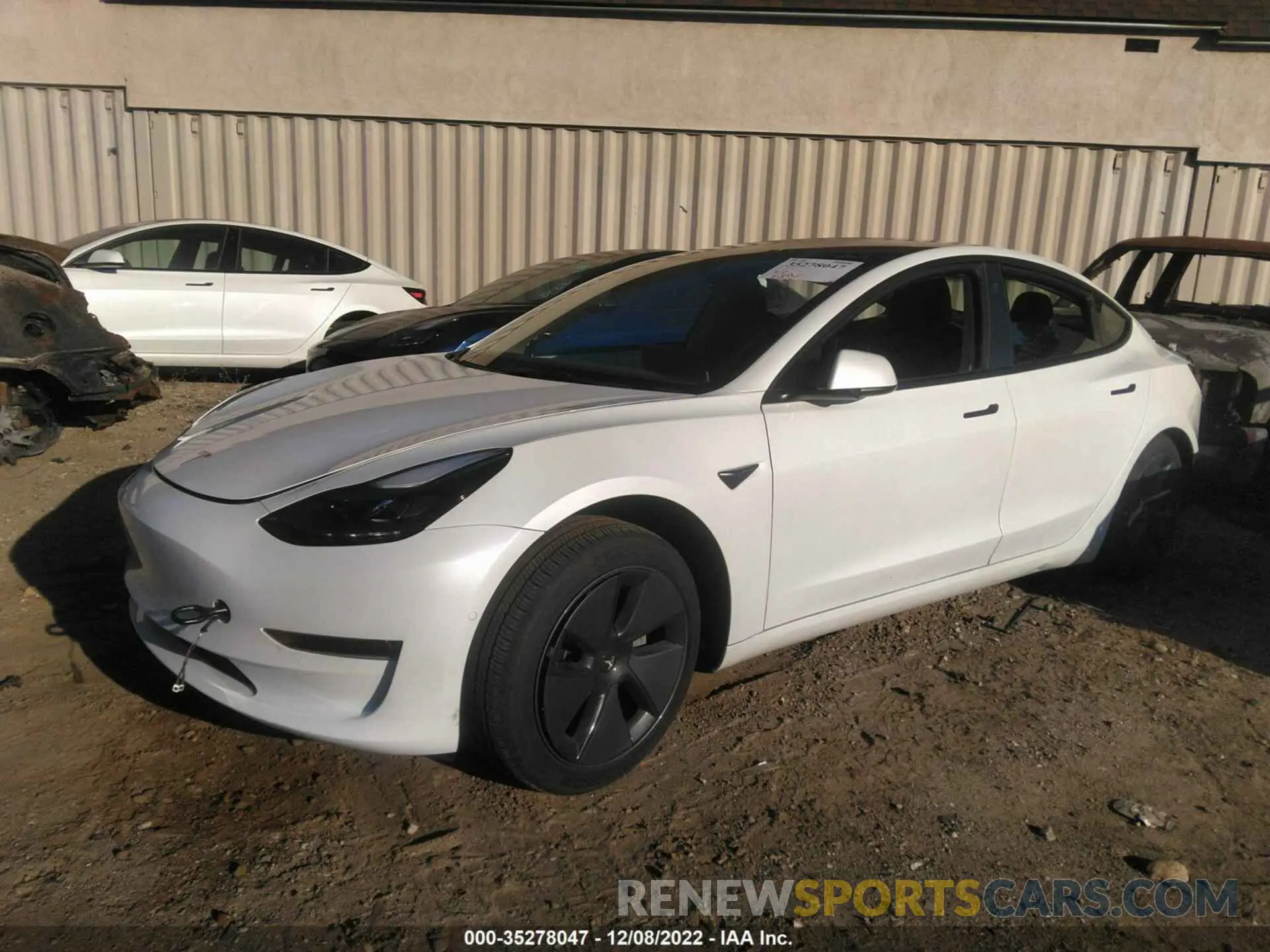 2 fotografías del automóvil dañado 5YJ3E1EB2NF182209 TESLA MODEL 3 2022