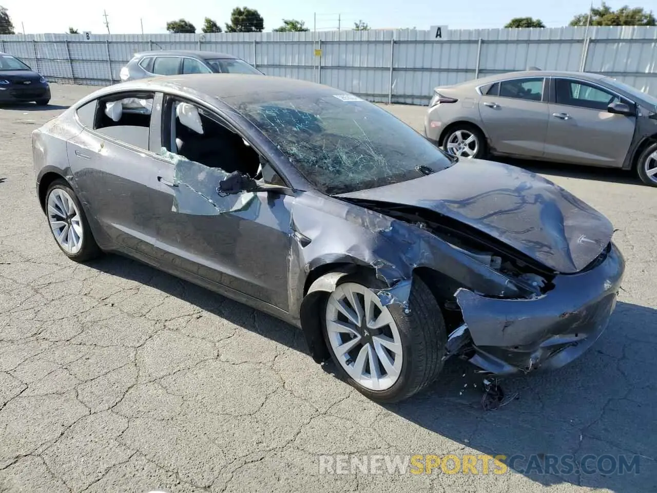4 fotografías del automóvil dañado 5YJ3E1EB2NF192951 TESLA MODEL 3 2022