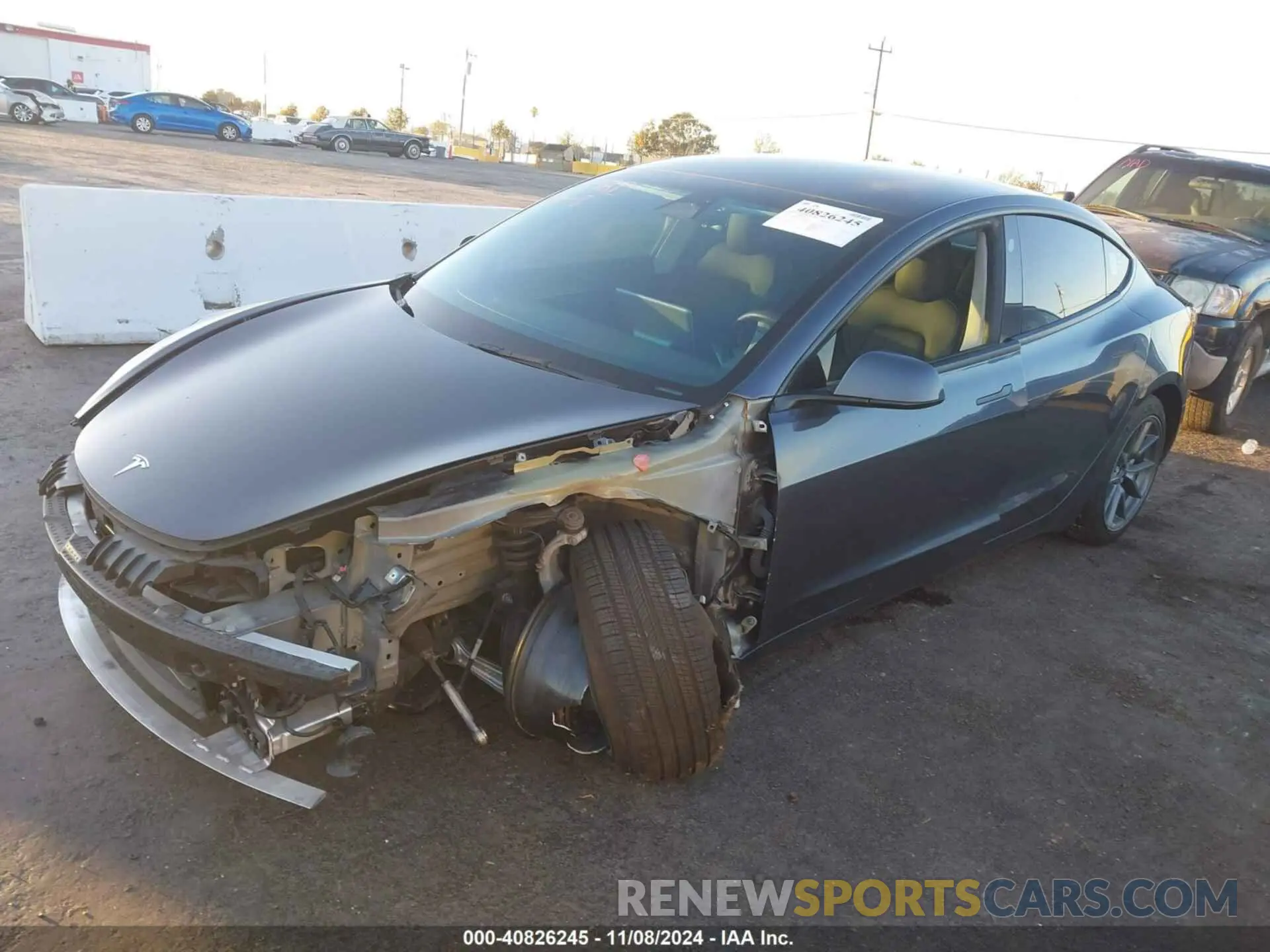 2 fotografías del automóvil dañado 5YJ3E1EB2NF207271 TESLA MODEL 3 2022