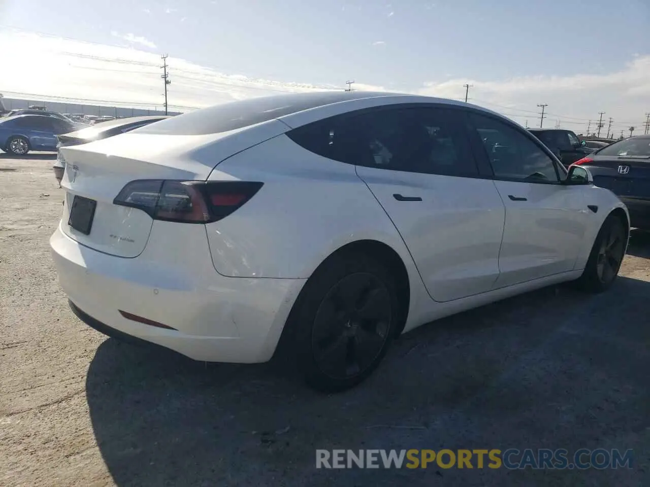 3 fotografías del automóvil dañado 5YJ3E1EB2NF210008 TESLA MODEL 3 2022