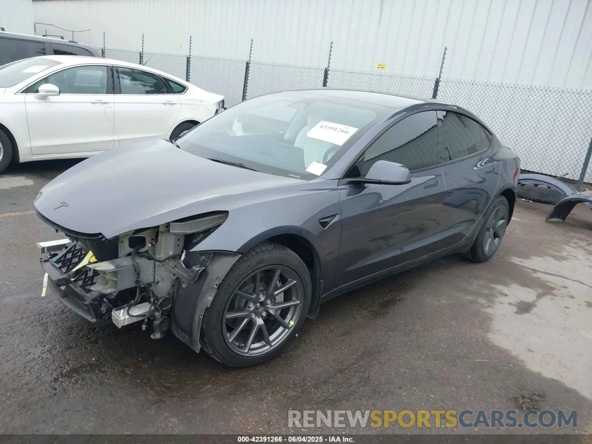 2 fotografías del automóvil dañado 5YJ3E1EB2NF259483 TESLA MODEL 3 2022