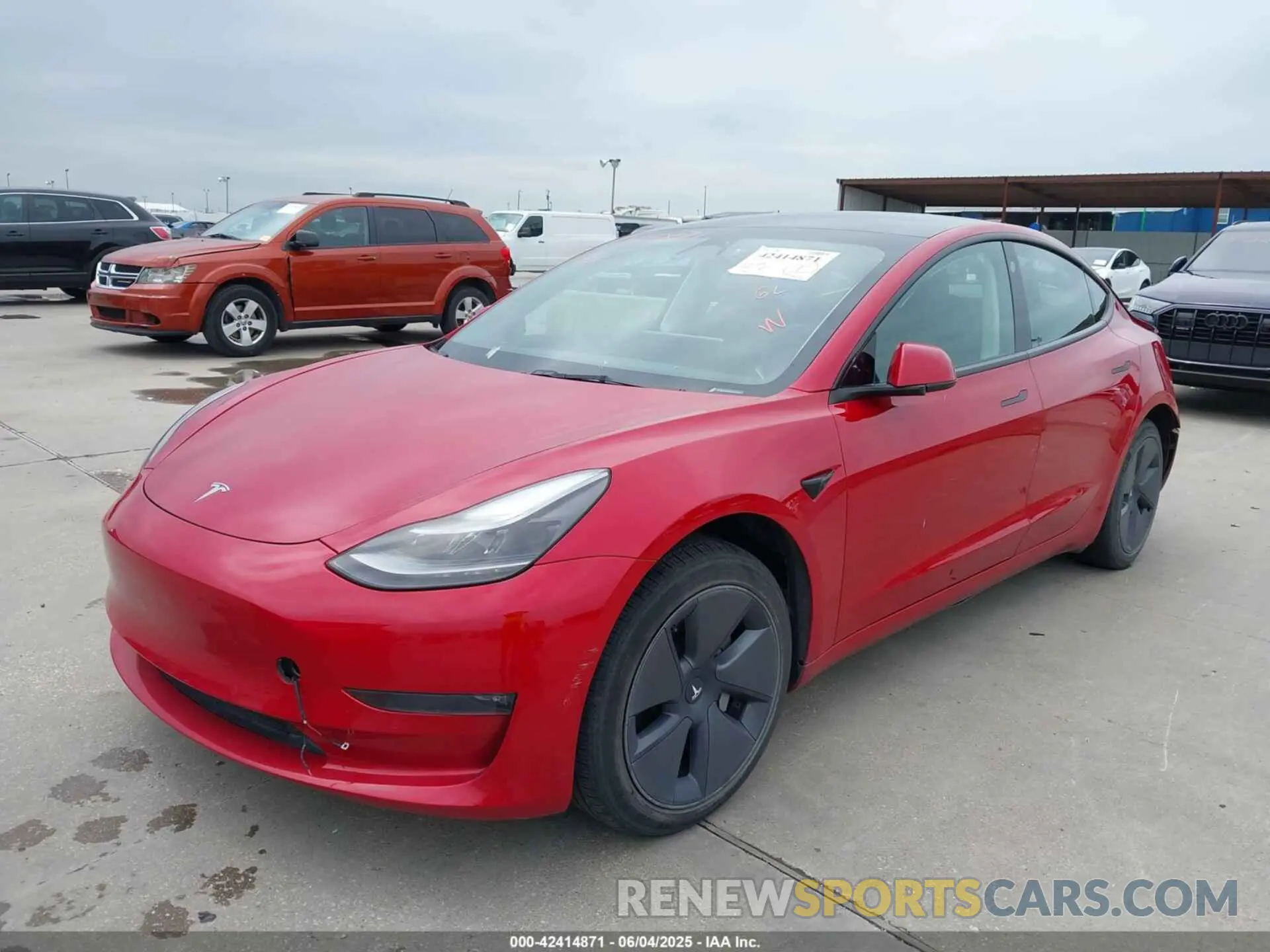 2 fotografías del automóvil dañado 5YJ3E1EB2NF267213 TESLA MODEL 3 2022