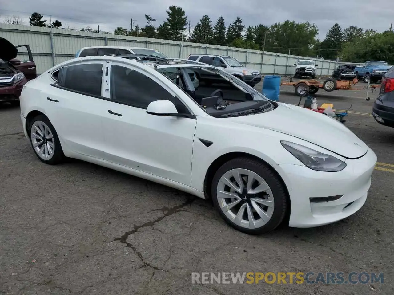 4 fotografías del automóvil dañado 5YJ3E1EB2NF272606 TESLA MODEL 3 2022