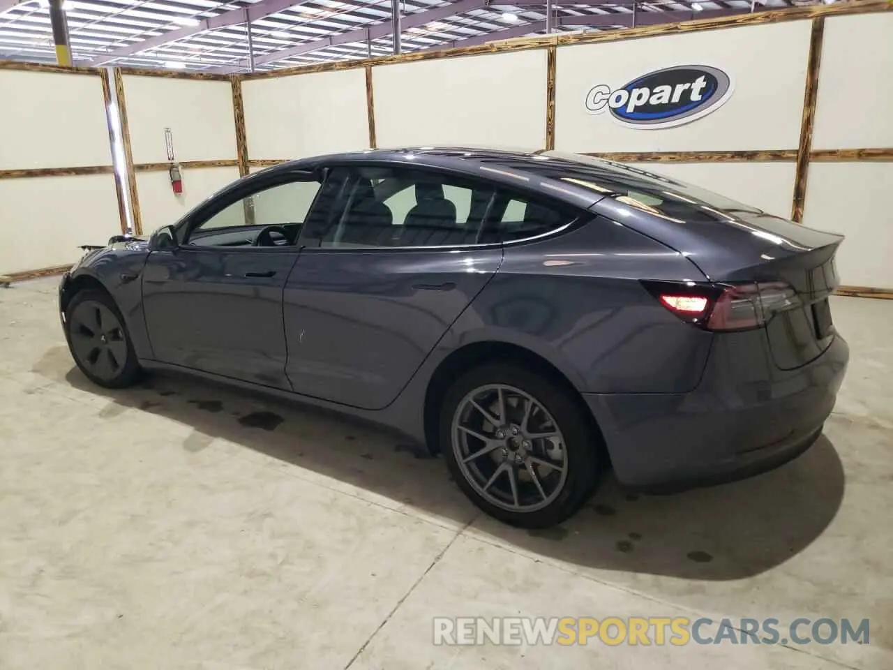 2 fotografías del automóvil dañado 5YJ3E1EB2NF286392 TESLA MODEL 3 2022