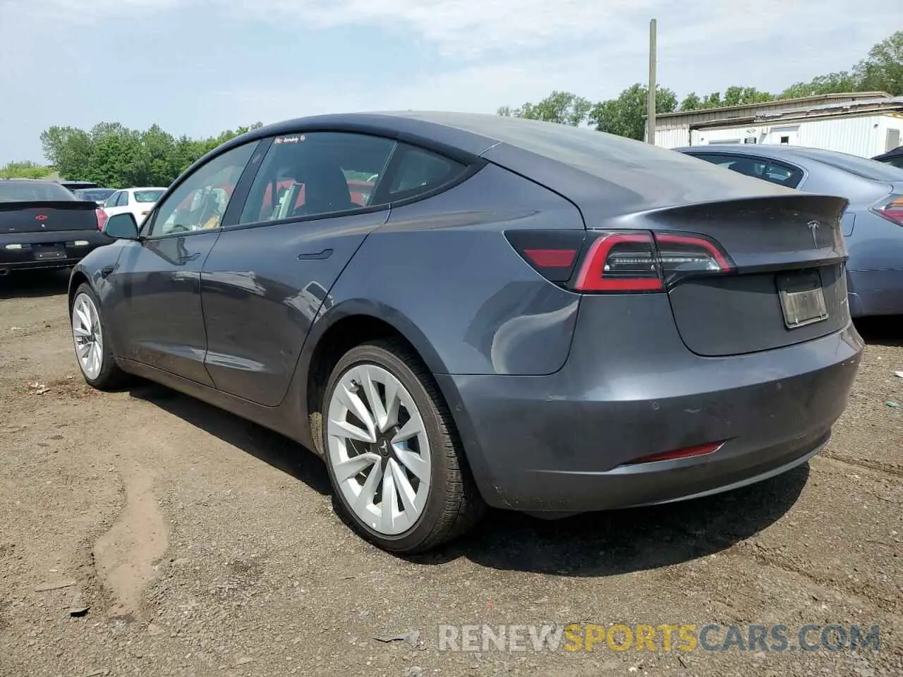 2 fotografías del automóvil dañado 5YJ3E1EB2NF289356 TESLA MODEL 3 2022