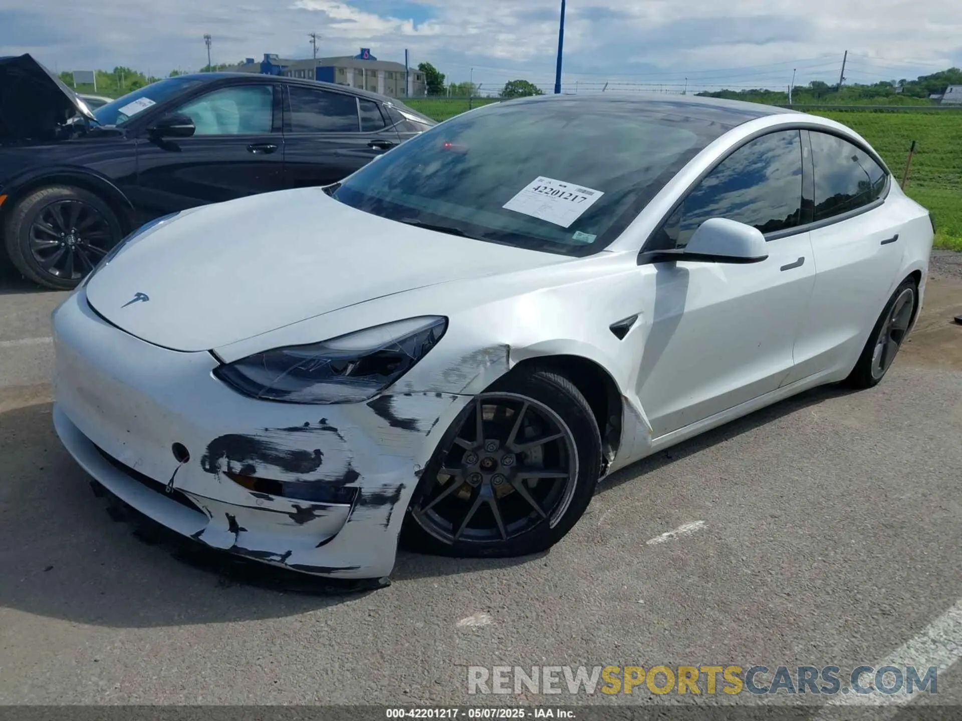 2 fotografías del automóvil dañado 5YJ3E1EB2NF313445 TESLA MODEL 3 2022