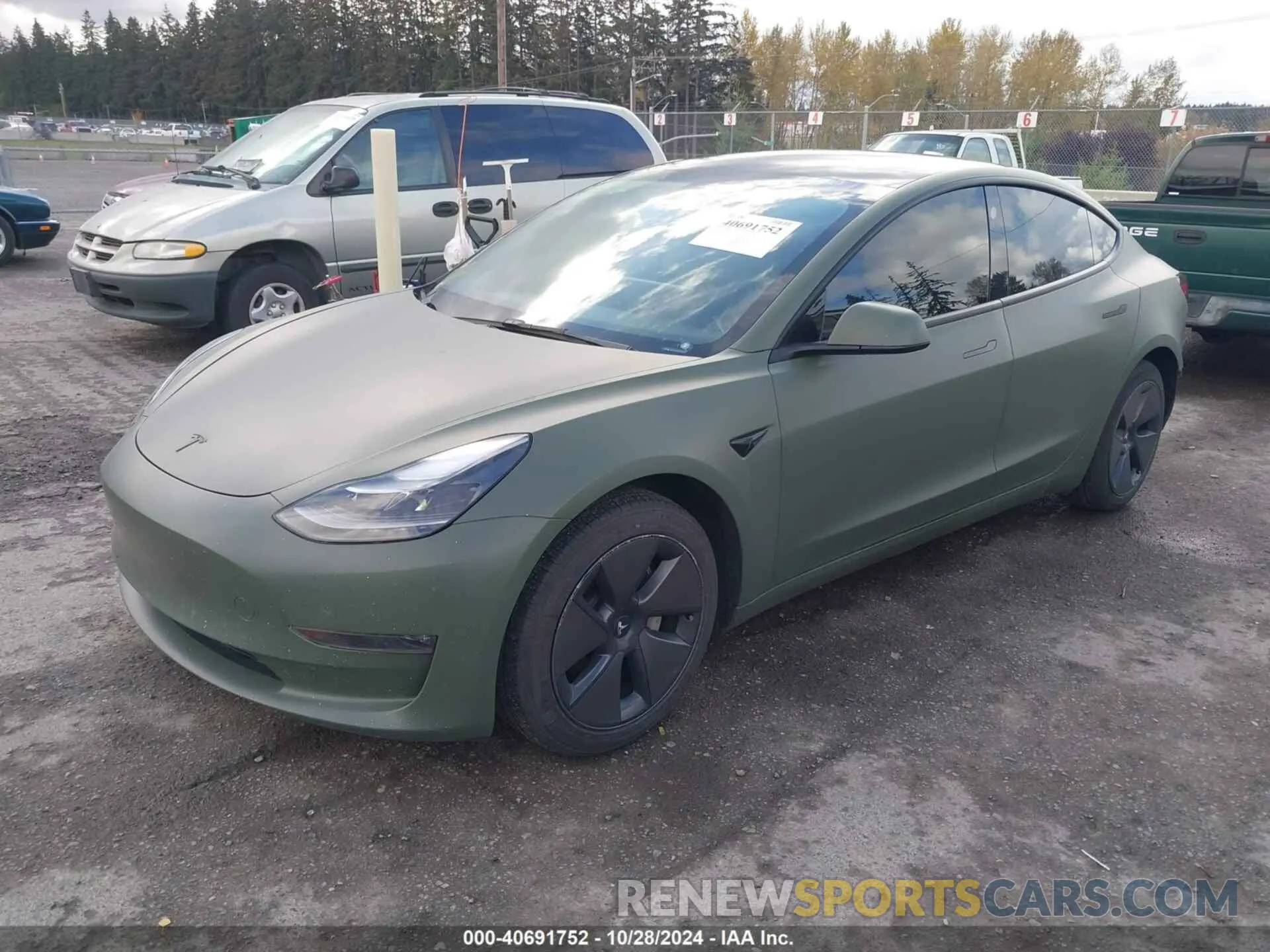2 fotografías del automóvil dañado 5YJ3E1EB2NF326941 TESLA MODEL 3 2022