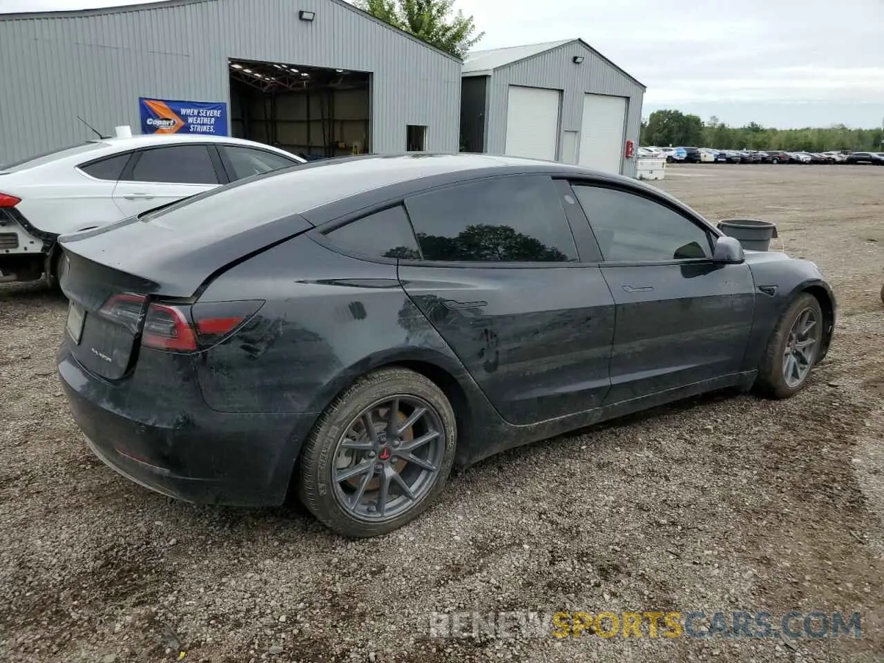3 fotografías del automóvil dañado 5YJ3E1EB2NF335770 TESLA MODEL 3 2022