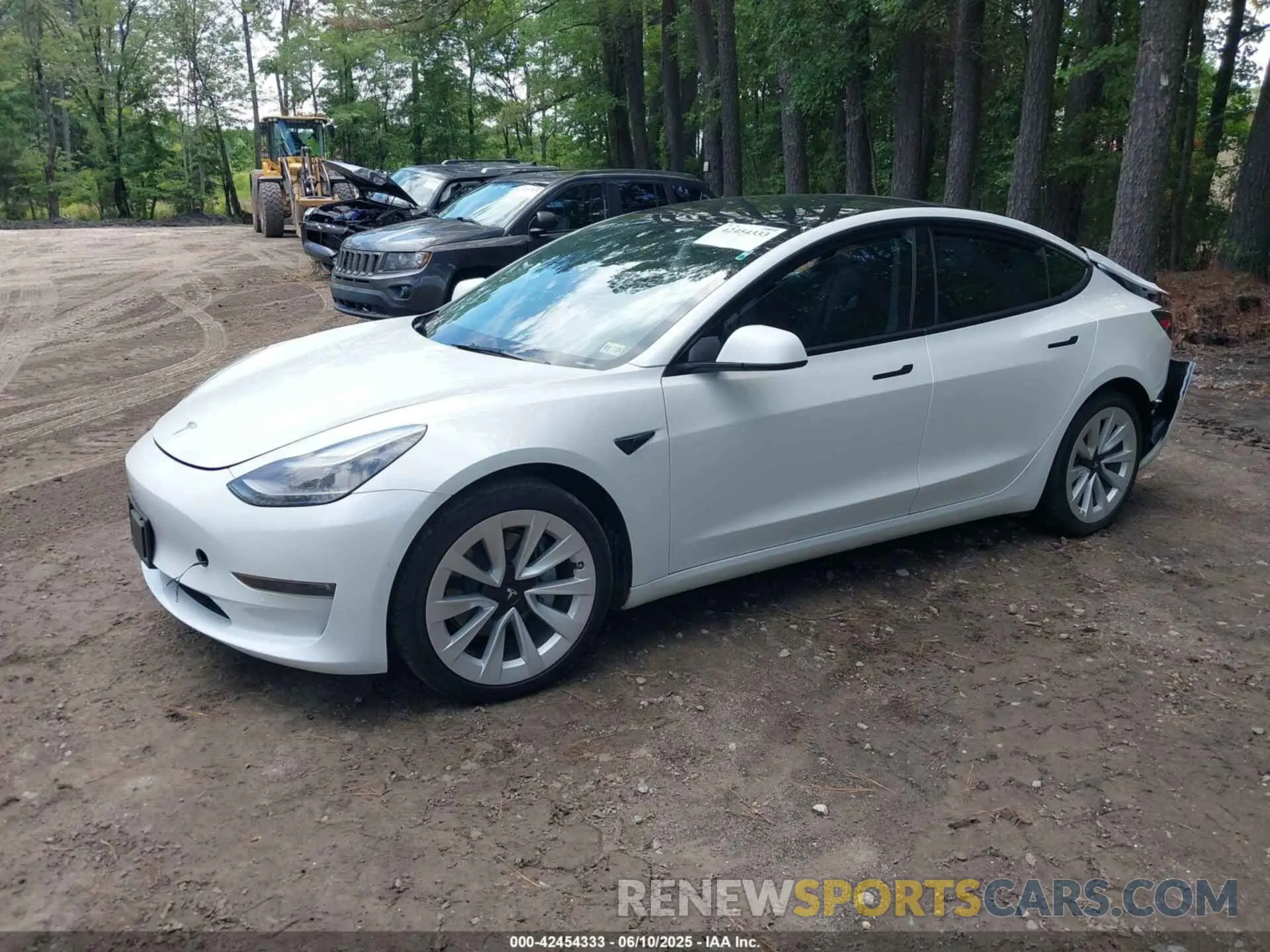 2 fotografías del automóvil dañado 5YJ3E1EB2NF359485 TESLA MODEL 3 2022