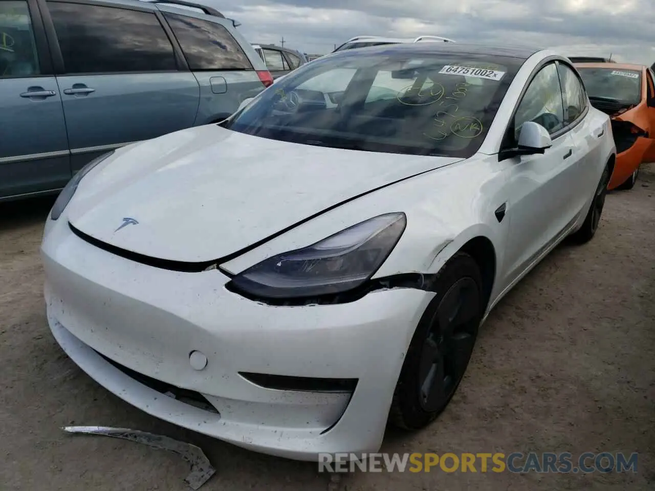 2 fotografías del automóvil dañado 5YJ3E1EB3NF104005 TESLA MODEL 3 2022