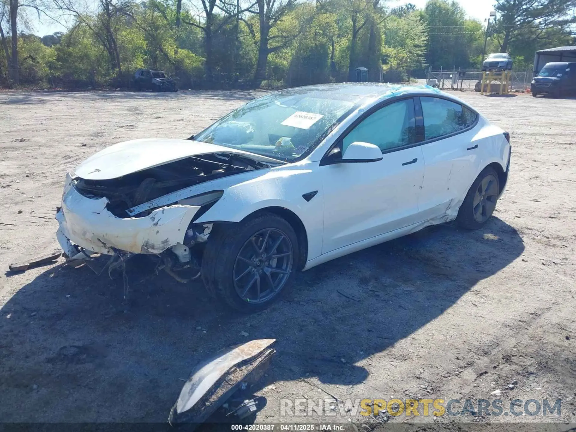 2 fotografías del automóvil dañado 5YJ3E1EB3NF105770 TESLA MODEL 3 2022