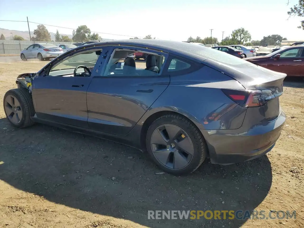 2 fotografías del automóvil dañado 5YJ3E1EB3NF123847 TESLA MODEL 3 2022