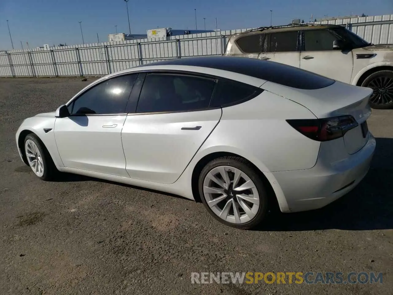 2 fotografías del automóvil dañado 5YJ3E1EB3NF130376 TESLA MODEL 3 2022