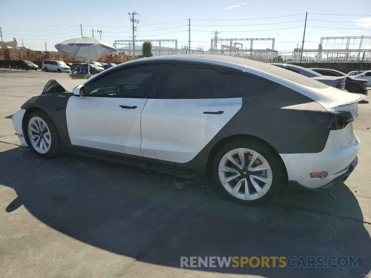 2 fotografías del automóvil dañado 5YJ3E1EB3NF143581 TESLA MODEL 3 2022