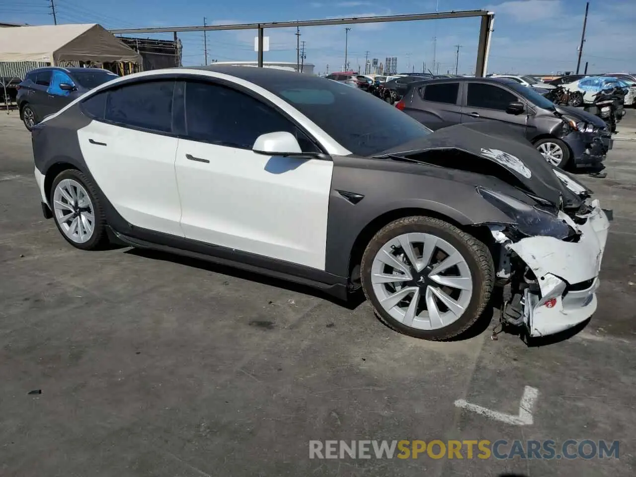 4 fotografías del automóvil dañado 5YJ3E1EB3NF143581 TESLA MODEL 3 2022
