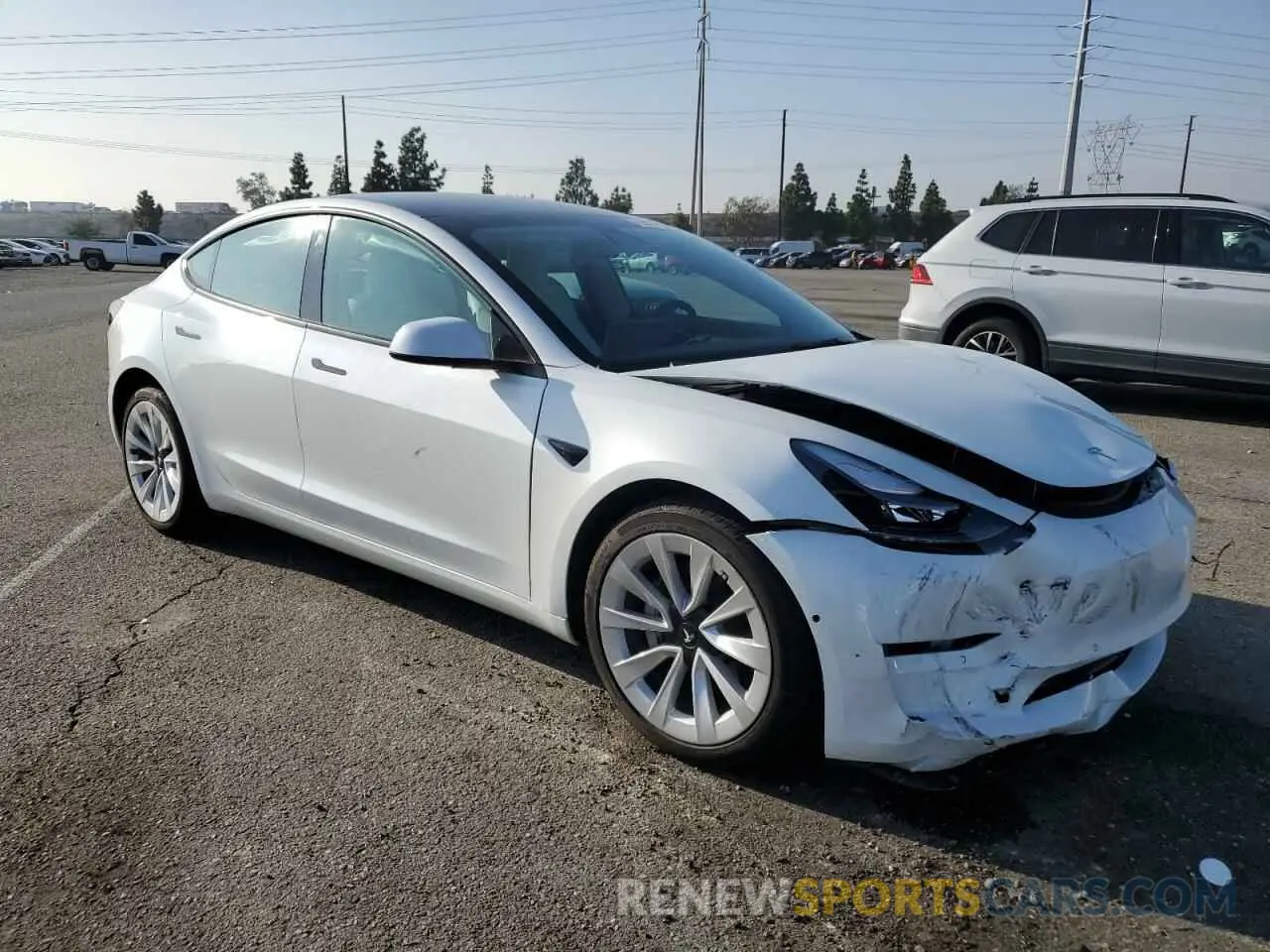 4 fotografías del automóvil dañado 5YJ3E1EB3NF152684 TESLA MODEL 3 2022