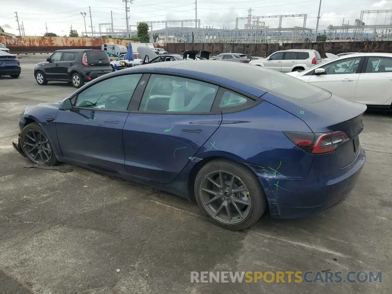 2 fotografías del automóvil dañado 5YJ3E1EB3NF195681 TESLA MODEL 3 2022