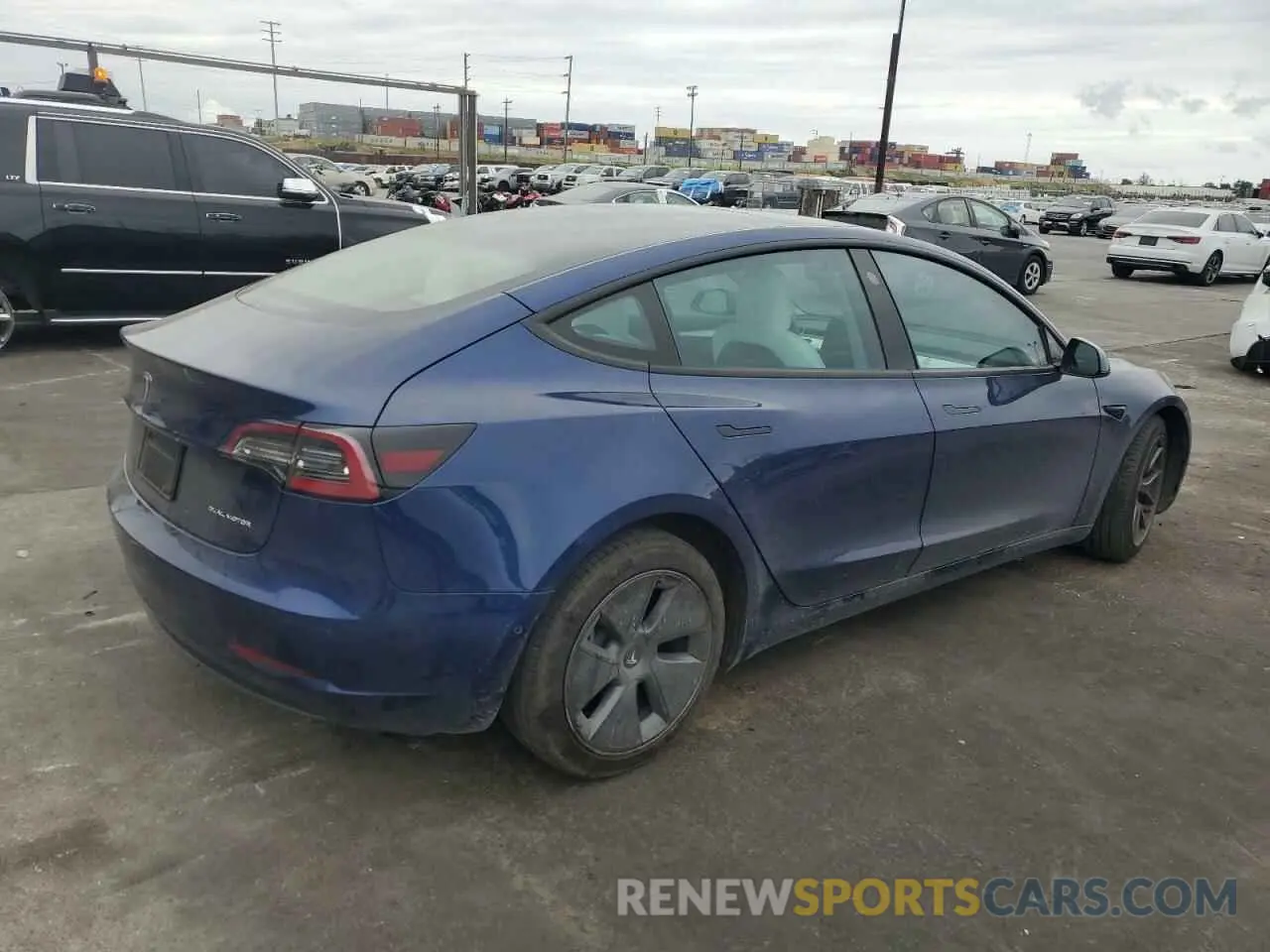 3 fotografías del automóvil dañado 5YJ3E1EB3NF195681 TESLA MODEL 3 2022