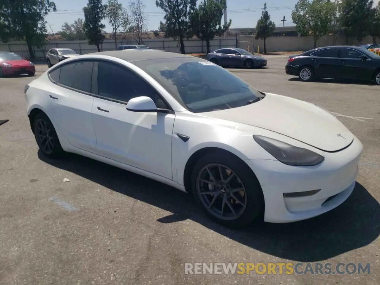 4 fotografías del automóvil dañado 5YJ3E1EB3NF211961 TESLA MODEL 3 2022