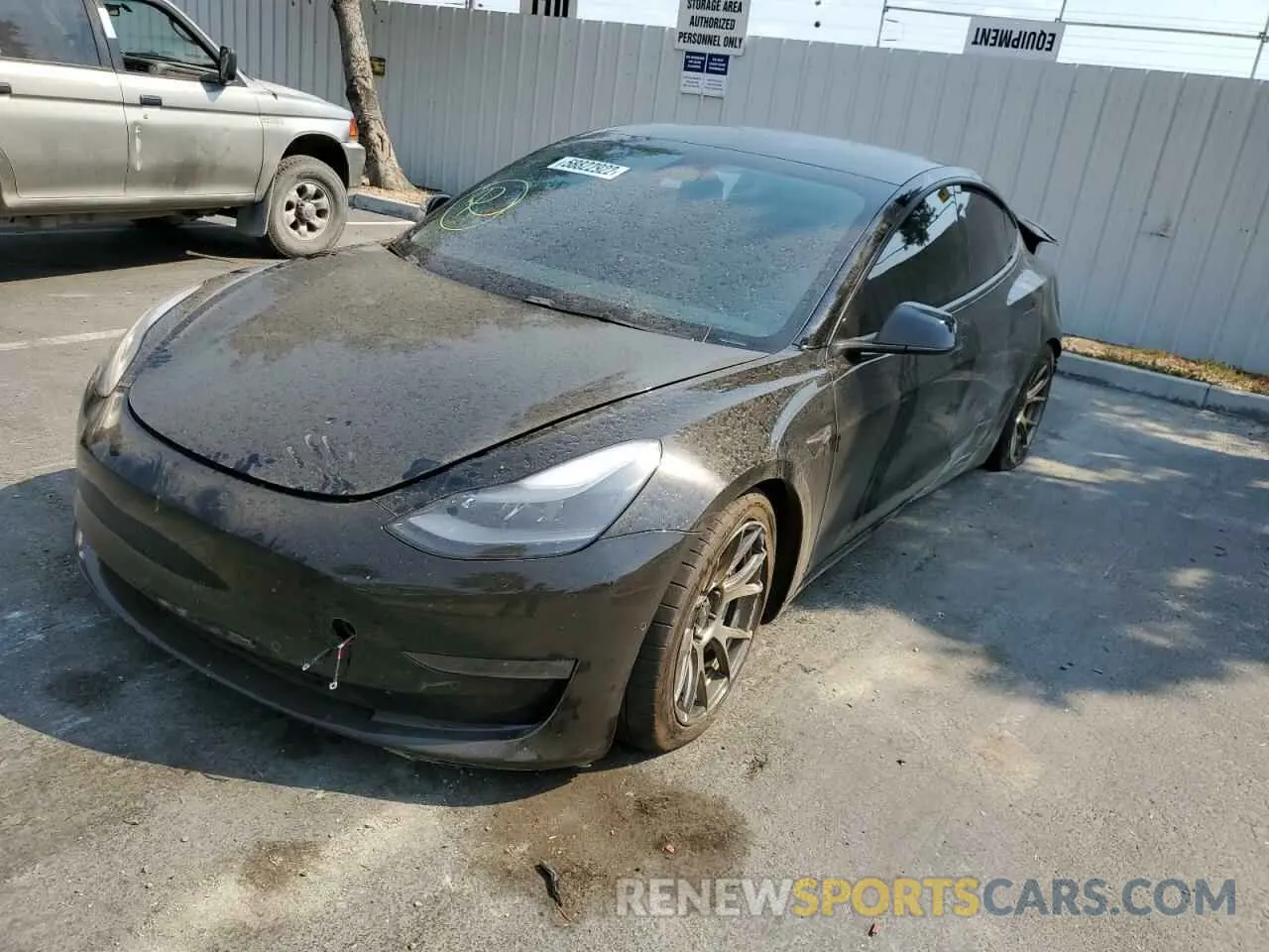 2 fotografías del automóvil dañado 5YJ3E1EB3NF233636 TESLA MODEL 3 2022