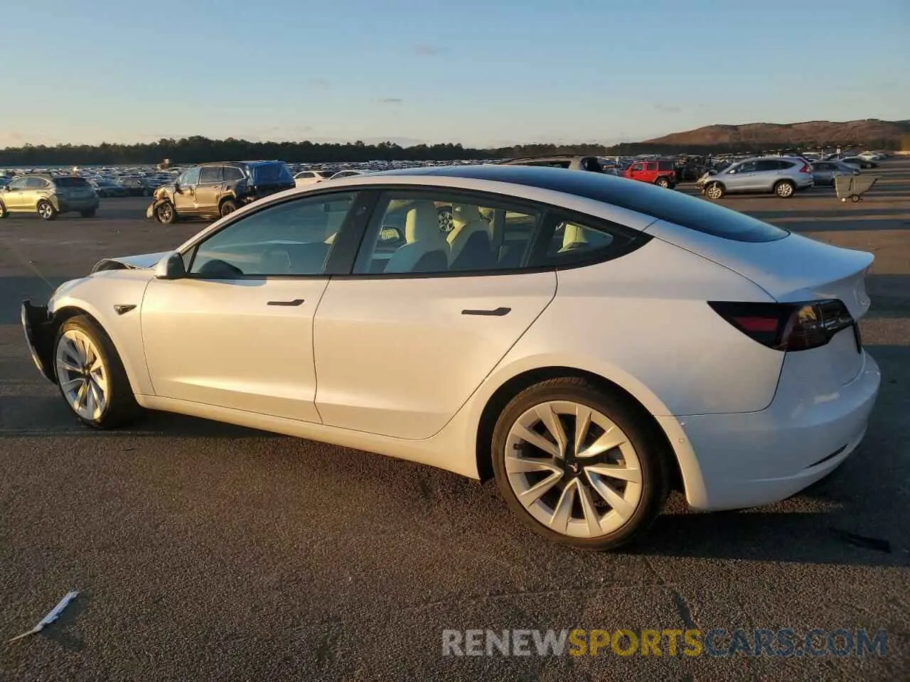 2 fotografías del automóvil dañado 5YJ3E1EB3NF238271 TESLA MODEL 3 2022