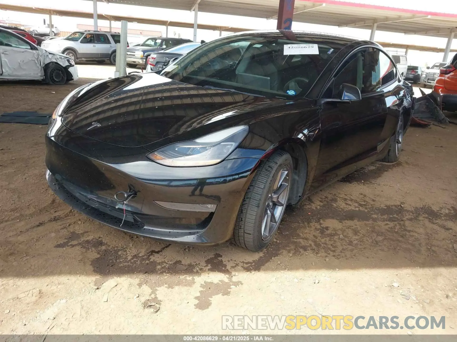 2 fotografías del automóvil dañado 5YJ3E1EB3NF257077 TESLA MODEL 3 2022