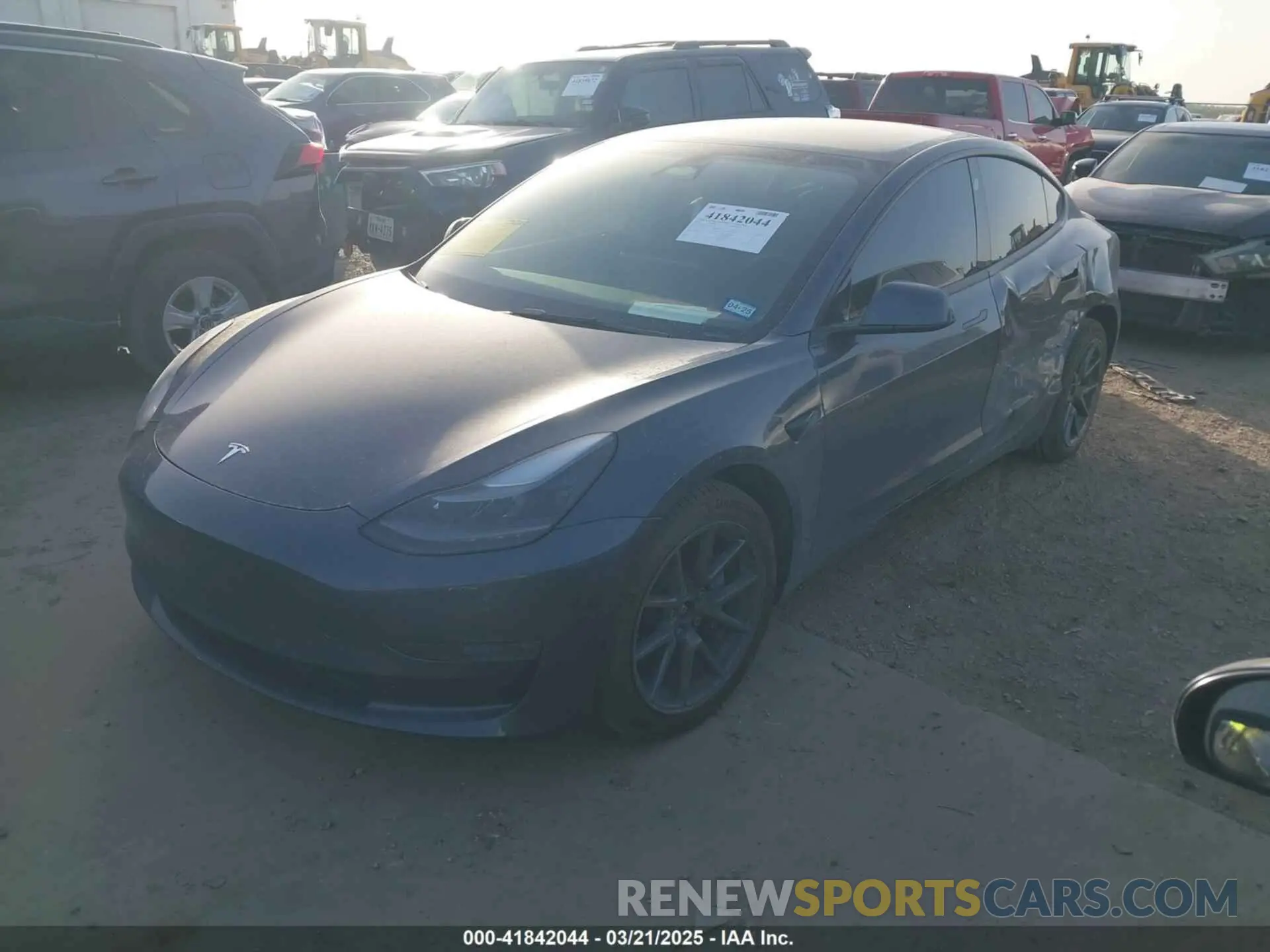 2 fotografías del automóvil dañado 5YJ3E1EB3NF264532 TESLA MODEL 3 2022