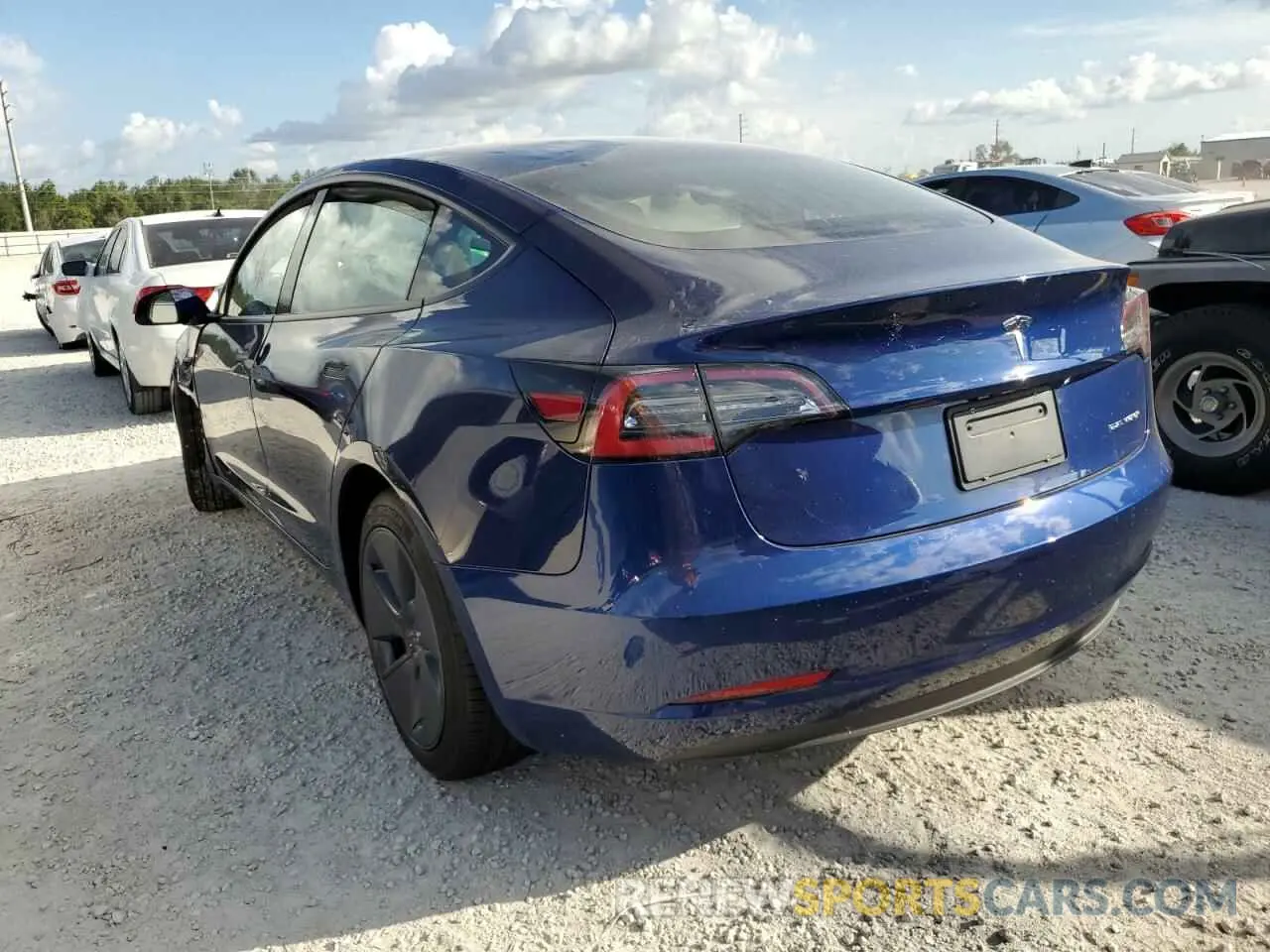 2 fotografías del automóvil dañado 5YJ3E1EB3NF274011 TESLA MODEL 3 2022