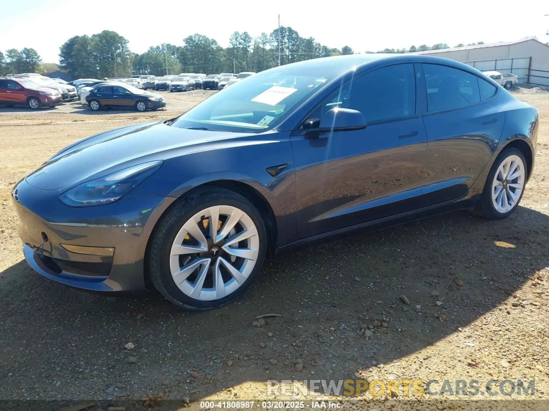 2 fotografías del automóvil dañado 5YJ3E1EB3NF309632 TESLA MODEL 3 2022