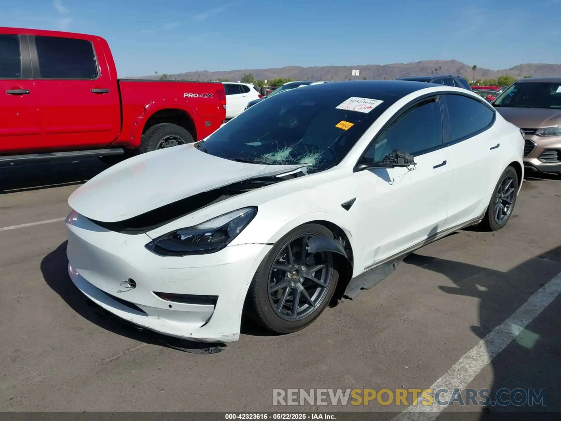 2 fotografías del automóvil dañado 5YJ3E1EB3NF348267 TESLA MODEL 3 2022