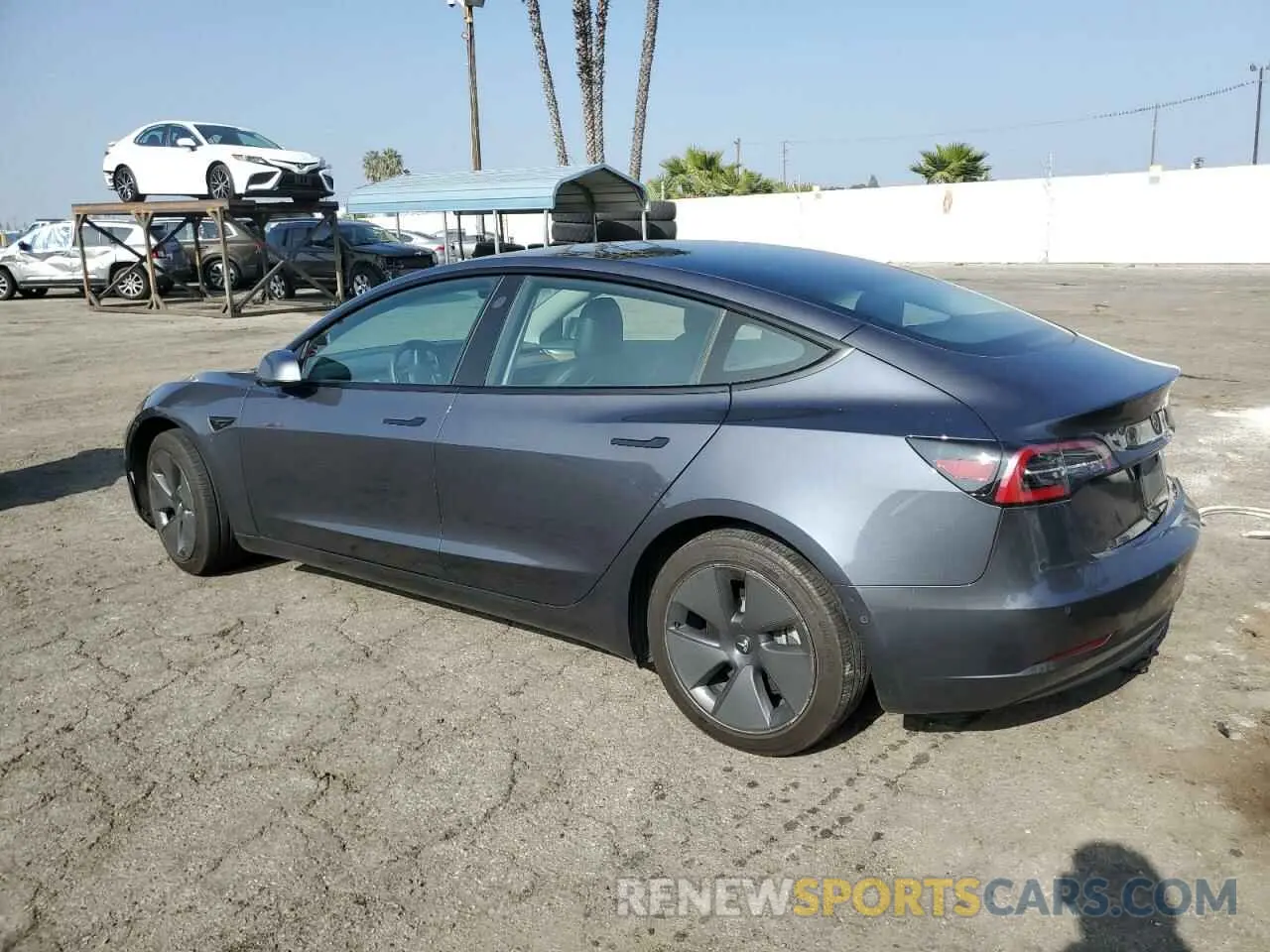 2 fotografías del automóvil dañado 5YJ3E1EB4NF108676 TESLA MODEL 3 2022