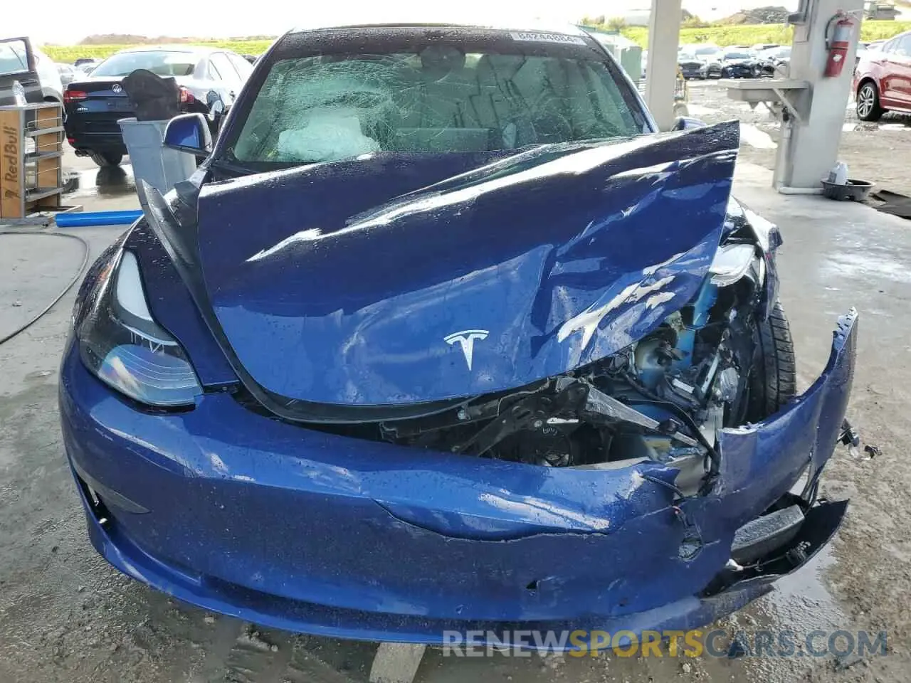 5 fotografías del automóvil dañado 5YJ3E1EB4NF114686 TESLA MODEL 3 2022
