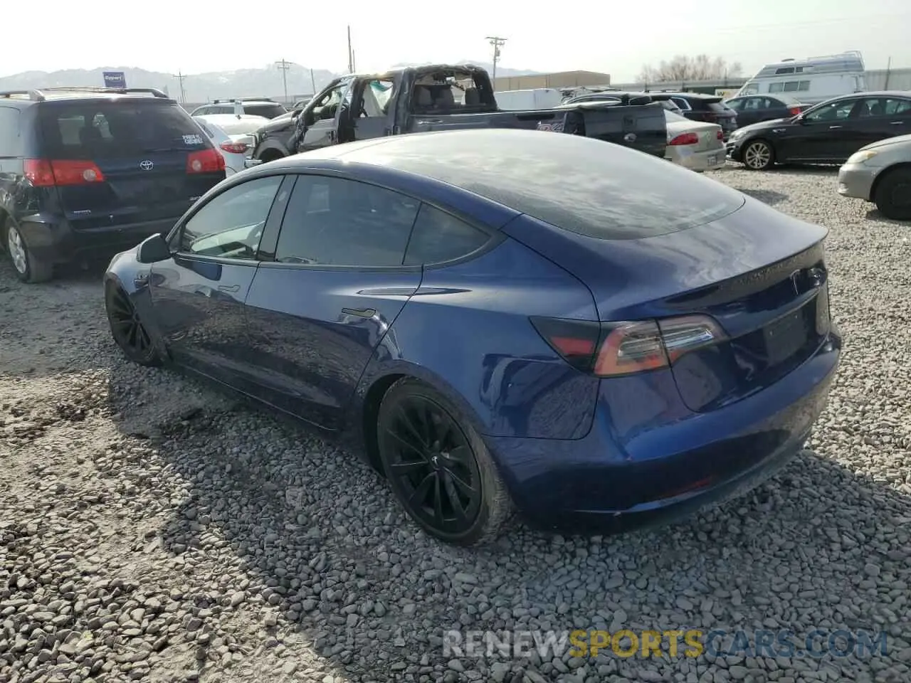 2 fotografías del automóvil dañado 5YJ3E1EB4NF143959 TESLA MODEL 3 2022